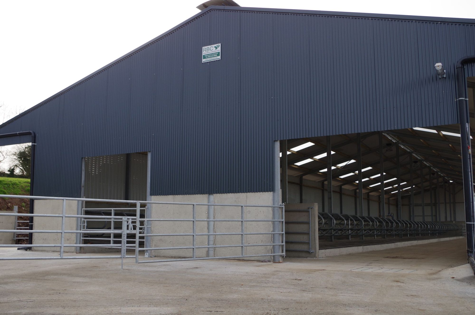 Large steel farming building for milking cows